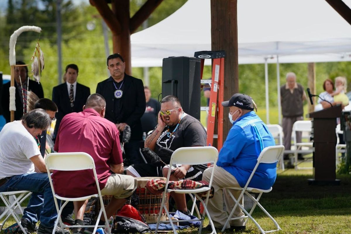 The Bois Forte Singers, including lead singer David Morrison Jr., center, performed an honor song during a ceremony at the Bois Forte Reservation in June.